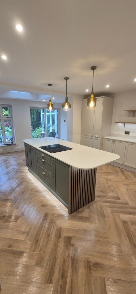 Kitchen island with feature timber end panel in newly renovated Wilmslow kitchen.