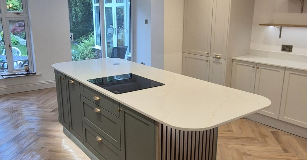 Kitchen island with feature timber end panel in newly renovated Wilmslow kitchen.